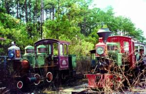 Image of #1 and #3 Fort Wilderness train's in open storage at WDW